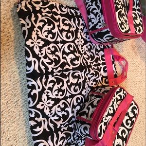 2 make up cases and a clothes holder